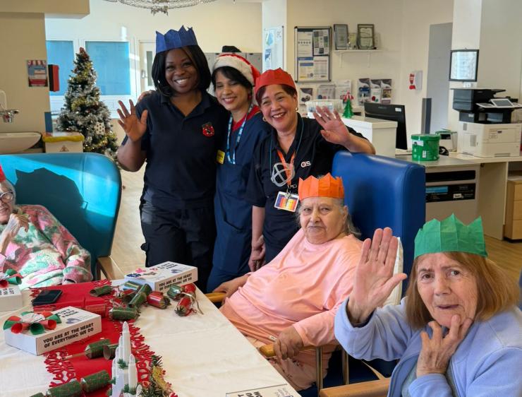 Patients With Staff At The Table