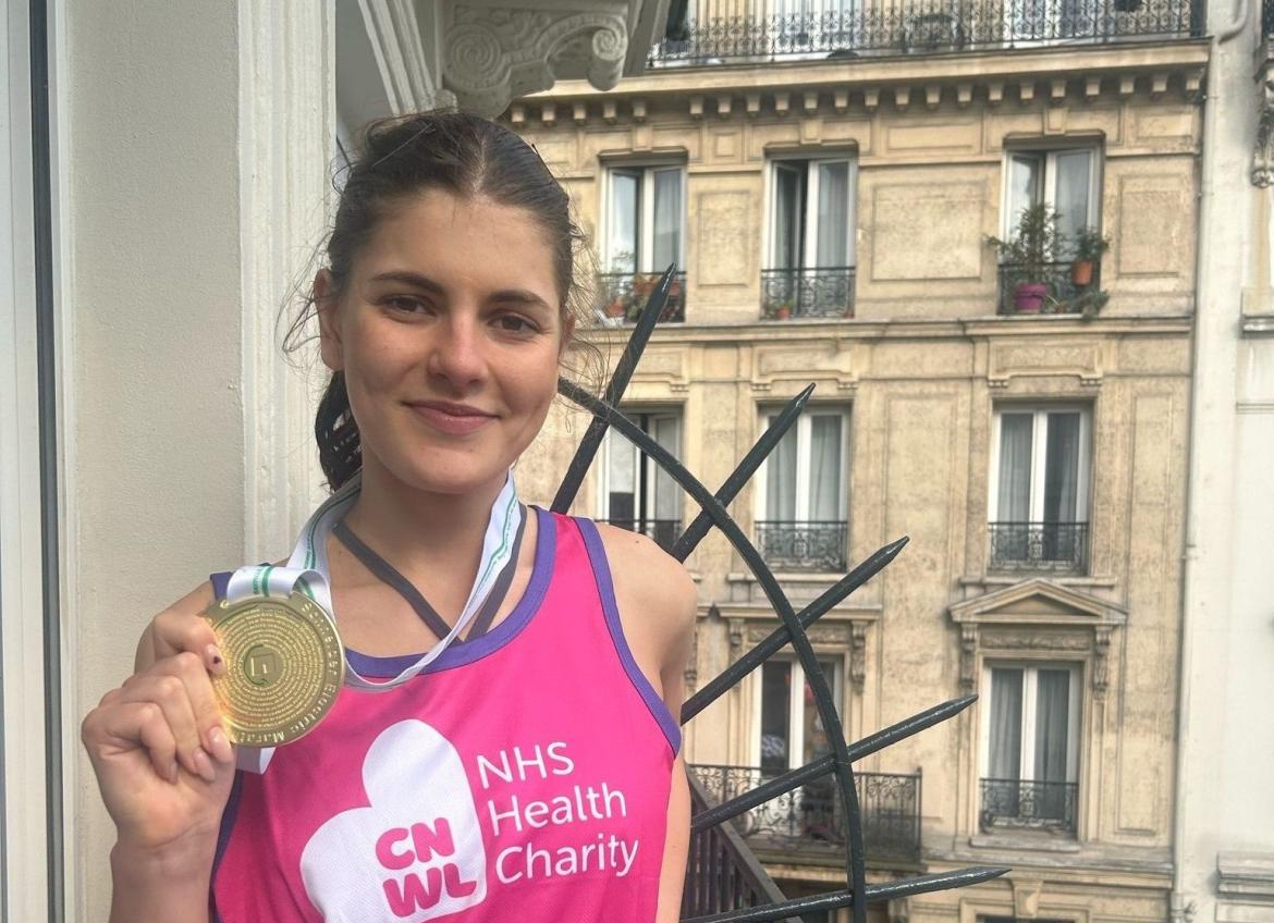Lucy With Her Medal For Paris Marathon Resized