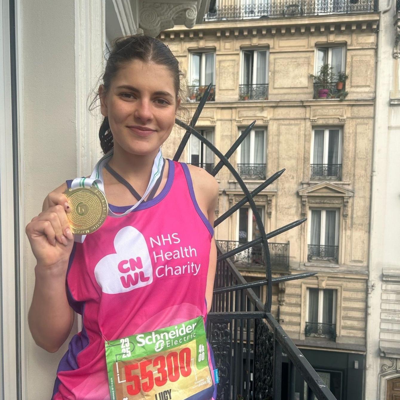 Lucy With Her Medal For Paris Marathon Resized