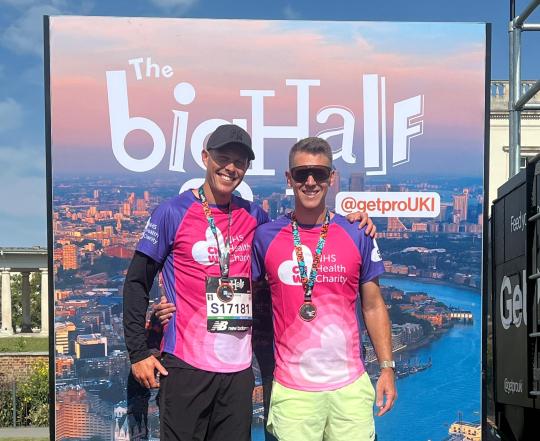 Max and Tim with their medals at the Big Half Marathon 2025