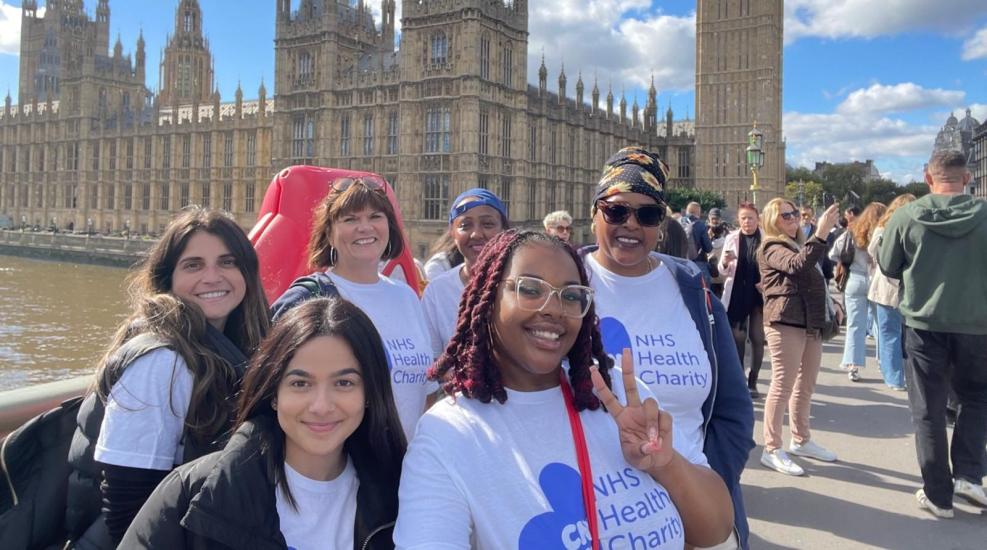 A group of people in front of Big Ben