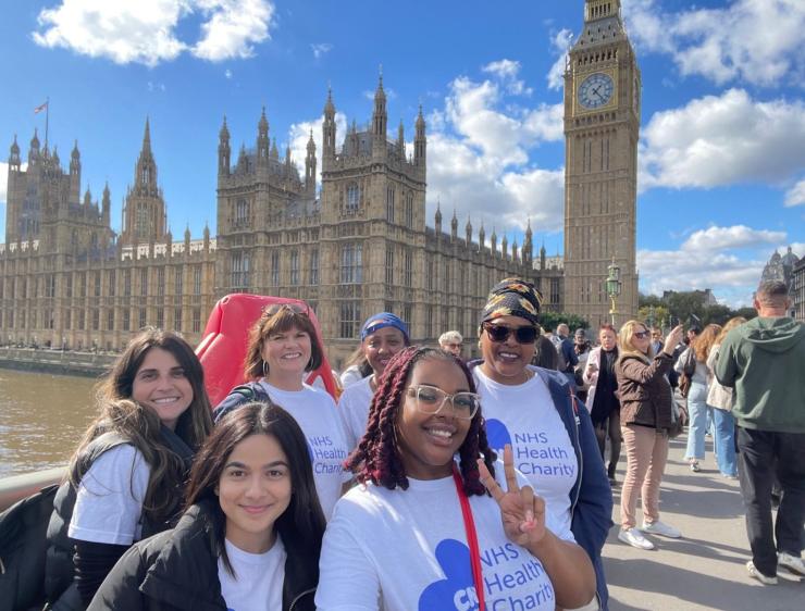 A group of people in front of Big Ben