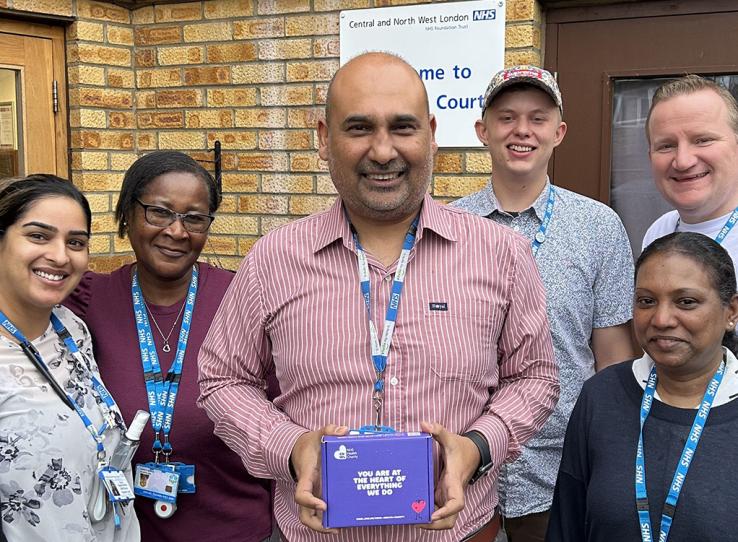 Staff At Rosedale Court With Wellbeing Boxes